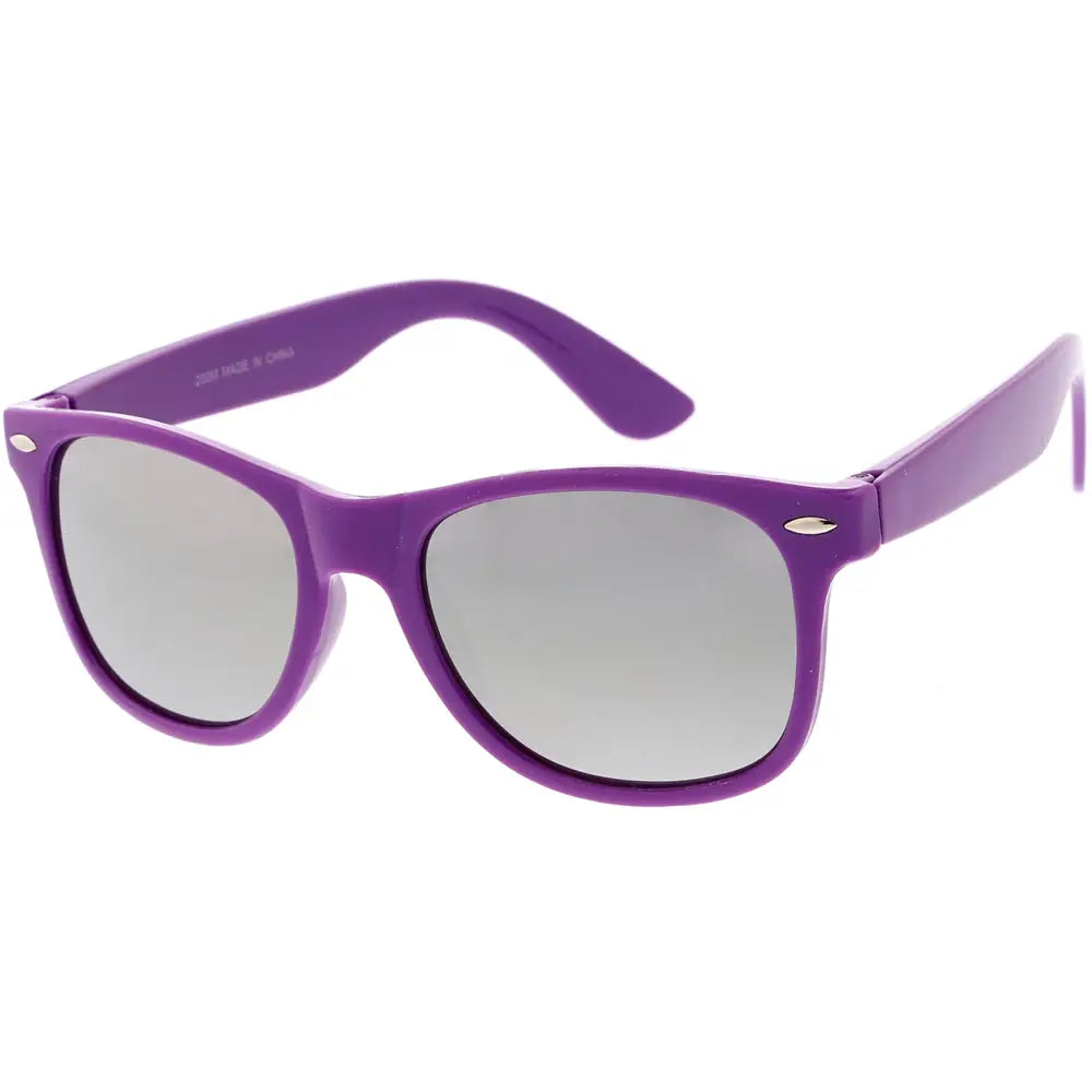 Purple plastic-framed sunglasses with gray gradient lenses in a set of 12 eyewear pieces