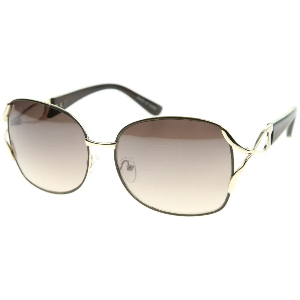 Gold-toned metal framed sunglasses with gradient brown to clear lenses and black temple tips in a set of 12