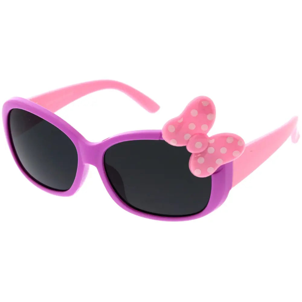 Children’s purple and pink sunglasses with round lenses and a polka-dotted bow on the temple set of 12