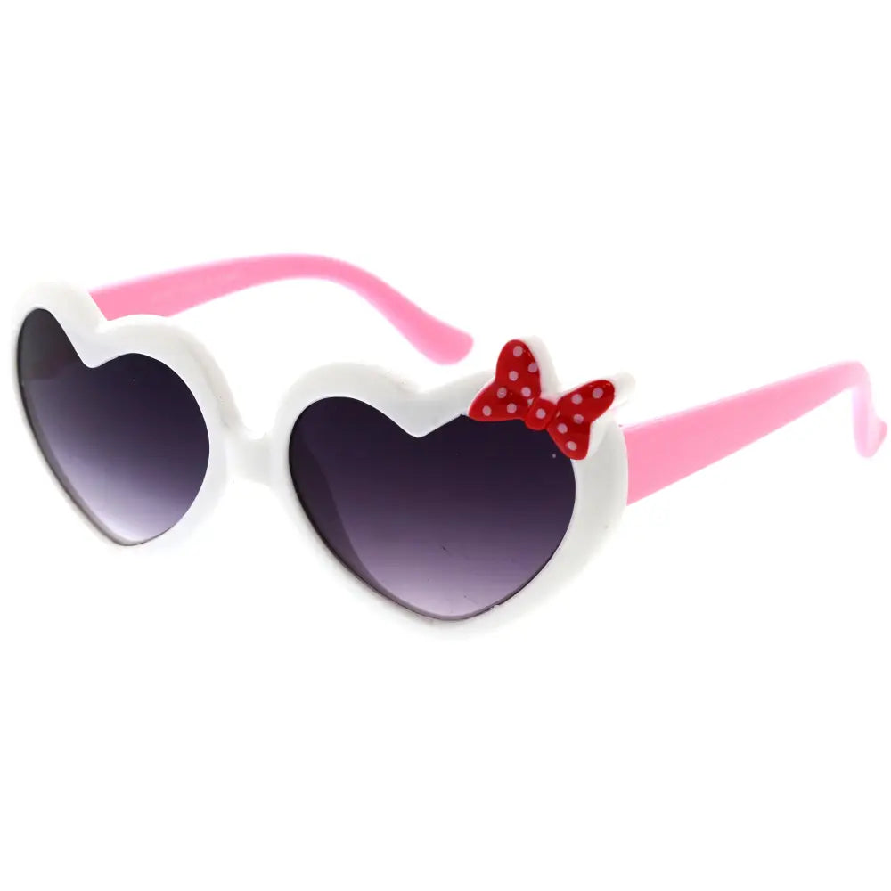 Heart-shaped sunglasses set of 12 with pink and white frames and red polka-dot bow on the right temple