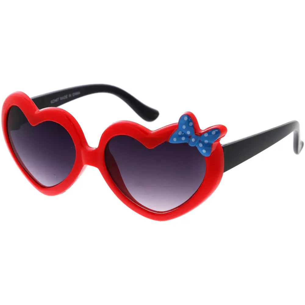 Red heart-shaped sunglasses with black temples and a blue polka-dot bow on the side kch67 set of 12
