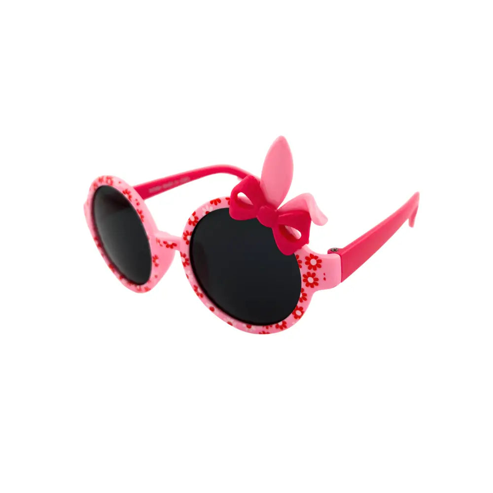 Pink children’s sunglasses with floral patterned frames and a matching pink bow on top set of 12 kids kch80