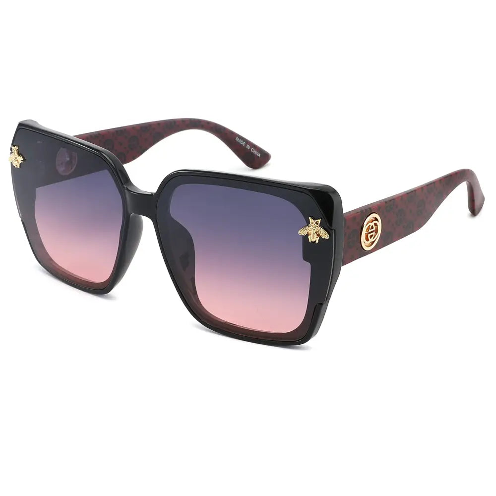 Black square-framed sunglasses with gradient pink to purple lenses and gold bee embellishments on temples set of 12