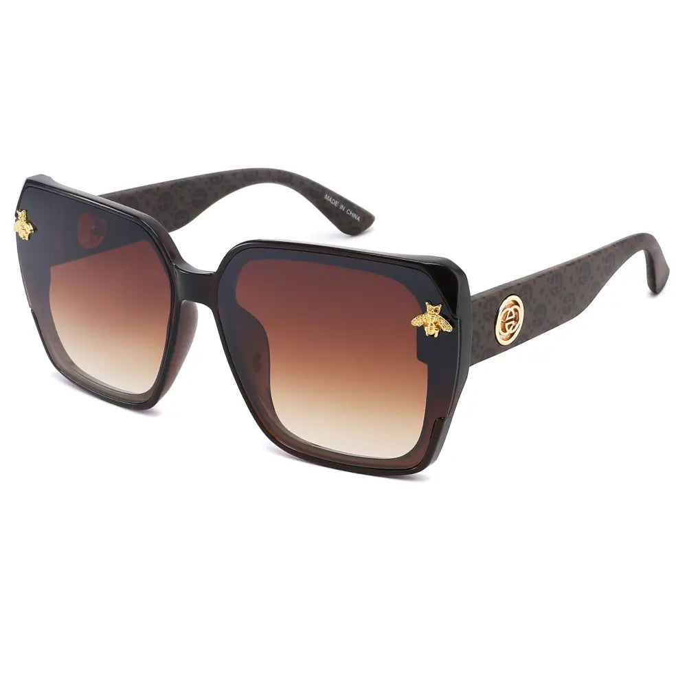 Black square-framed sunglasses with gold bee and circular logo accents and gradient brown lenses set of 12