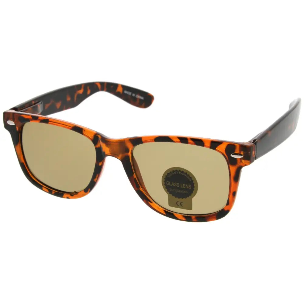 Set of 12 tortoiseshell frame sunglasses with gold-tinted glass lenses in a classic square shape
