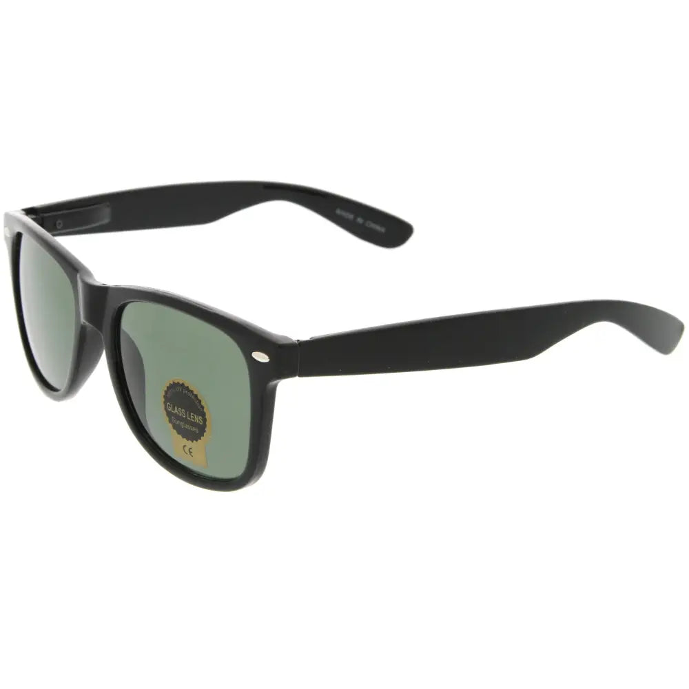 Set of 12 black plastic-framed sunglasses with green-tinted lenses and rectangular shape