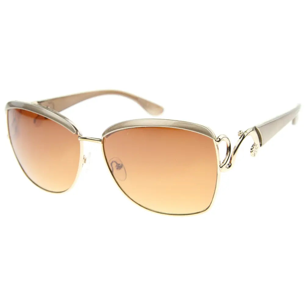 Set of 12 gold-toned sunglasses with gradient brown lenses and ornate metal detailing on the temples