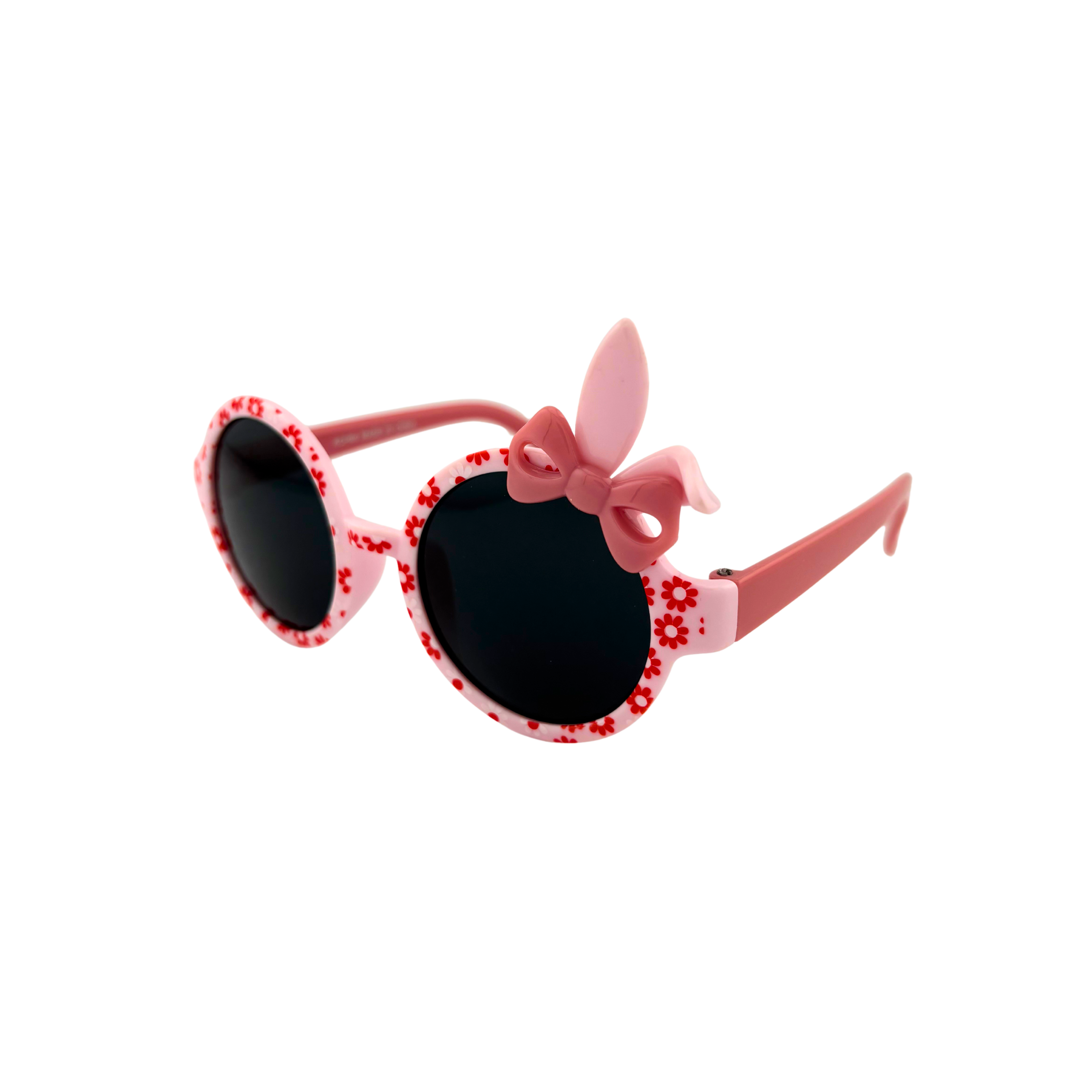 Pink sunglasses with floral details and a bow on a white background
