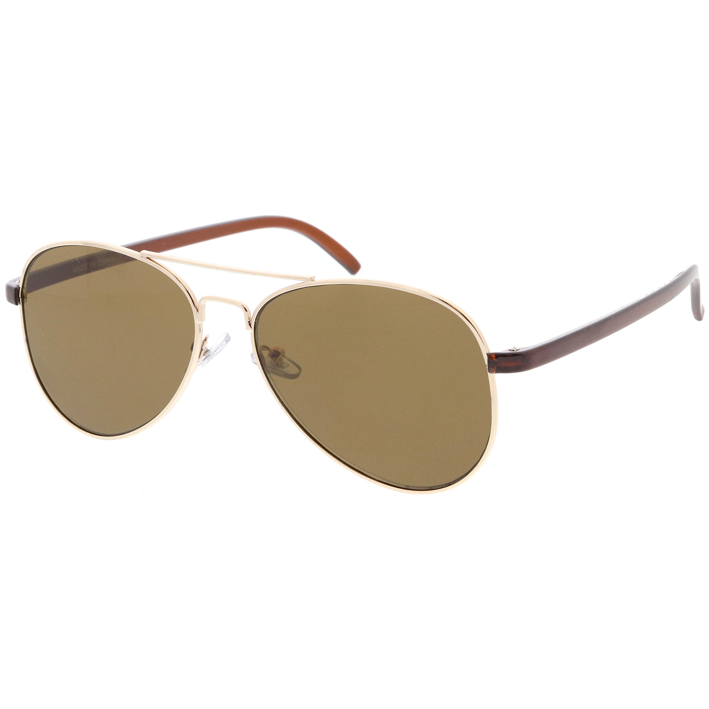 Stylish aviator sunglasses with metal frame and tinted lenses for a trendy, classic look.