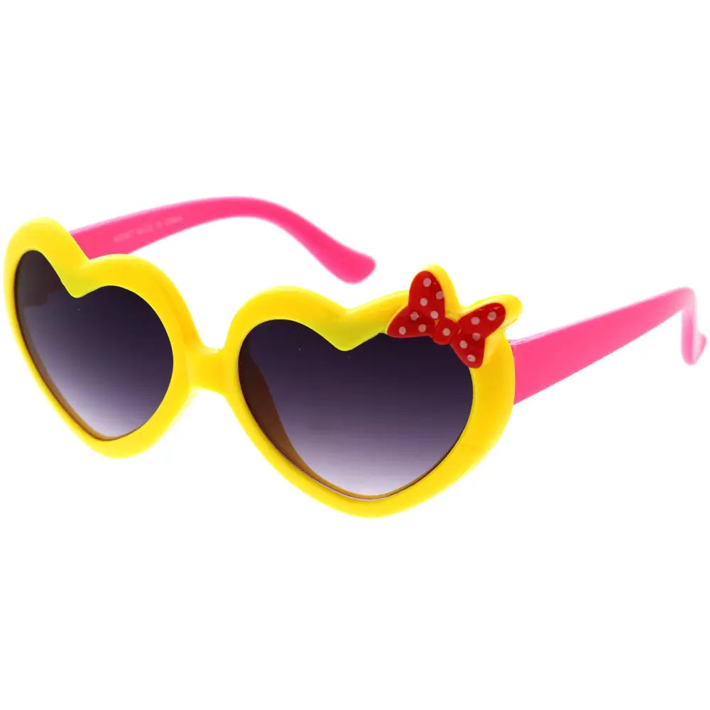 Bright yellow heart-shaped sunglasses with pink temples and a red polka-dot bow on the frame set of 12