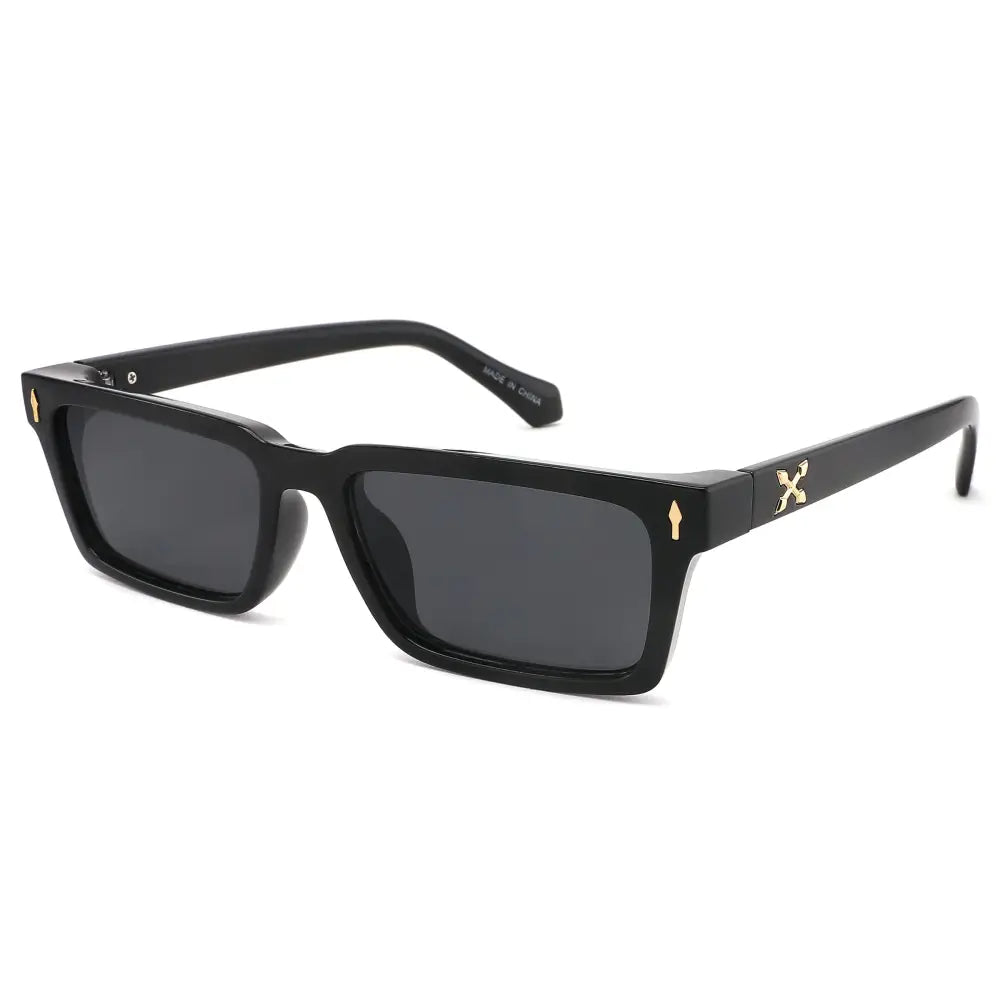Black sunglasses with gold accents on a white background