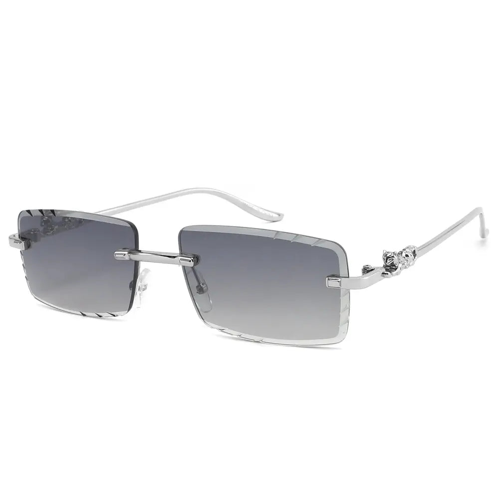 Silver-framed rectangular sunglasses with gradient gray lenses and decorative skull motifs on the temples set of 12