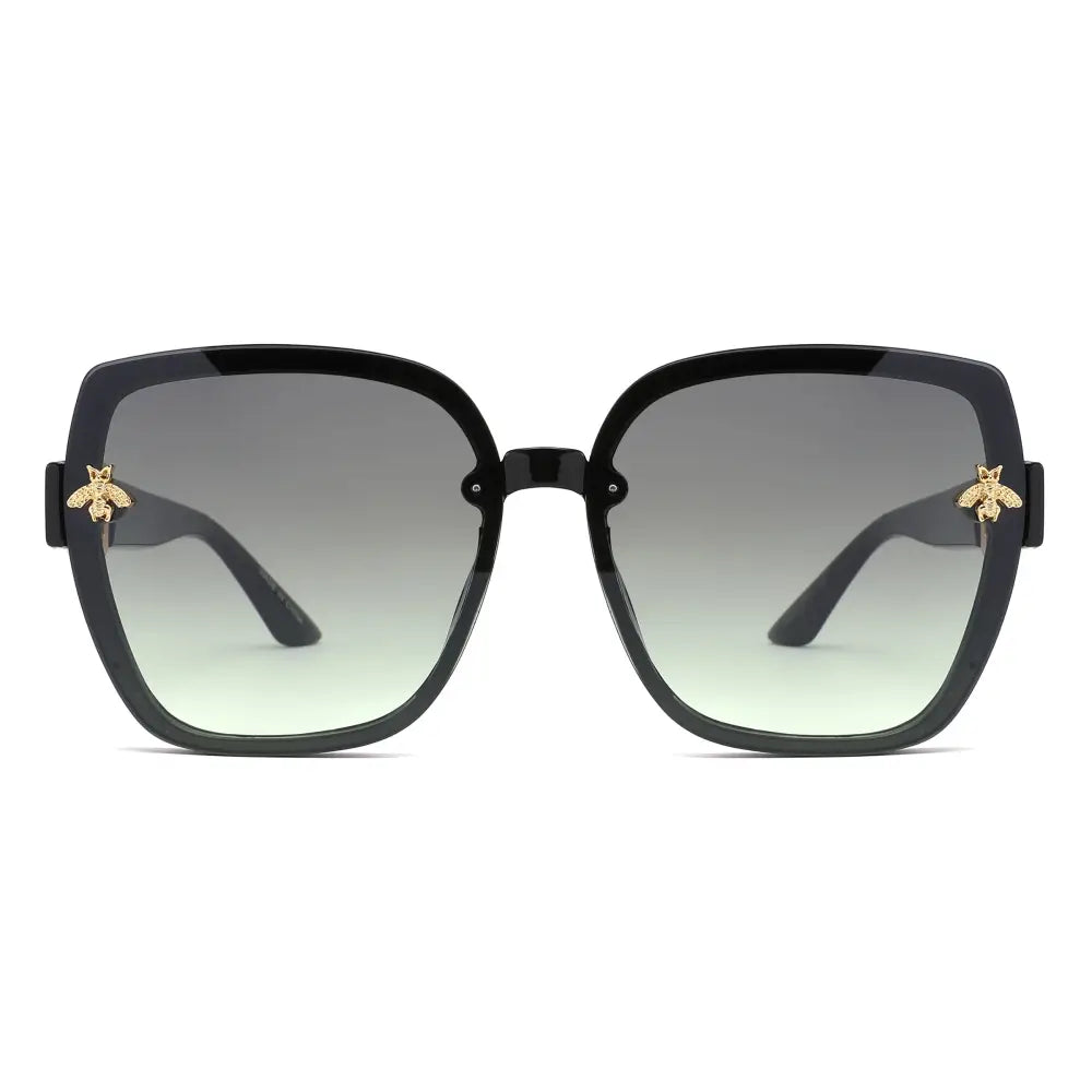 Black square-framed sunglasses with gold bee embellishments on temples and gradient green to gray lenses set of 12