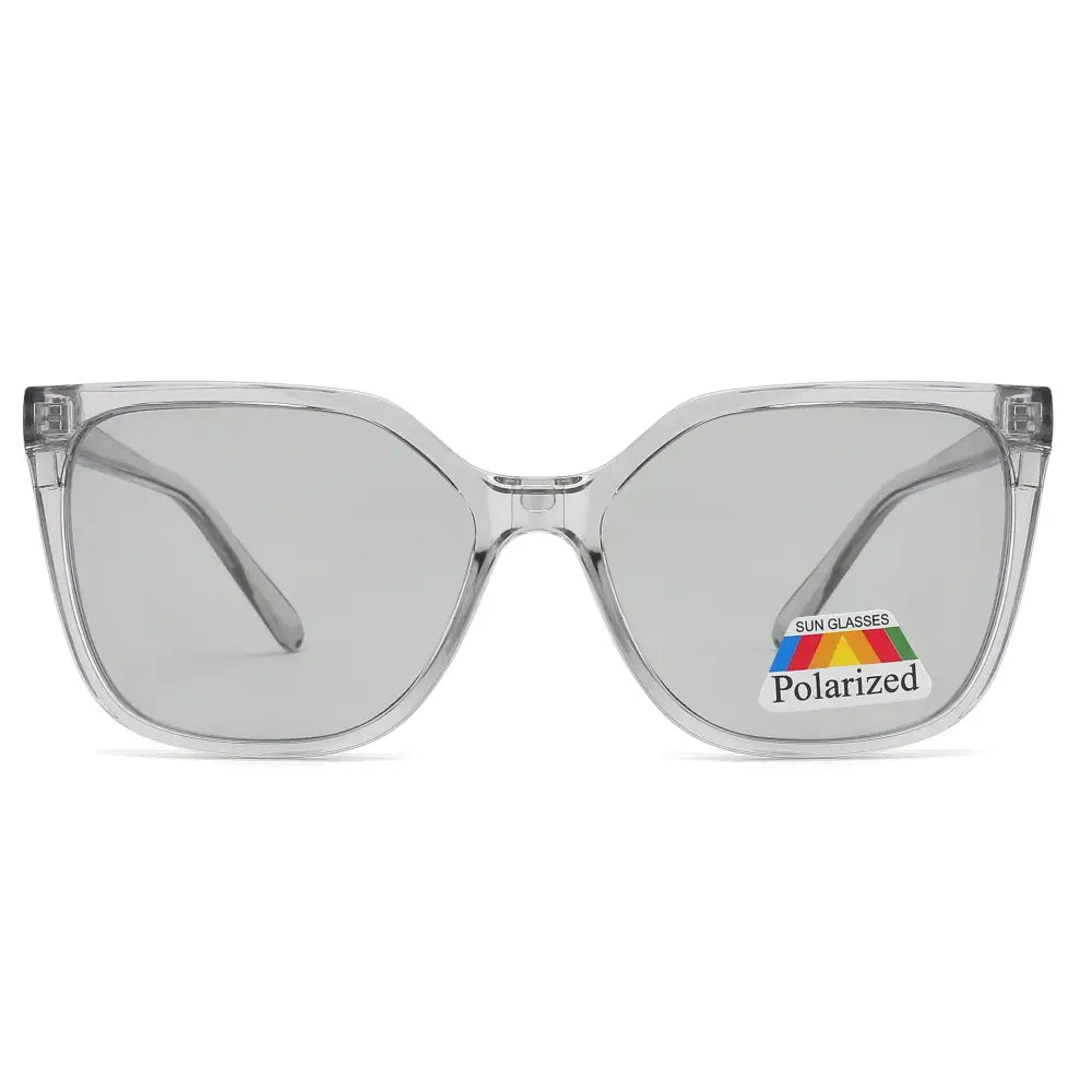 Clear acetate-framed sunglasses with gray polarized lenses and a blue light blocking polarized clip-on set of 12