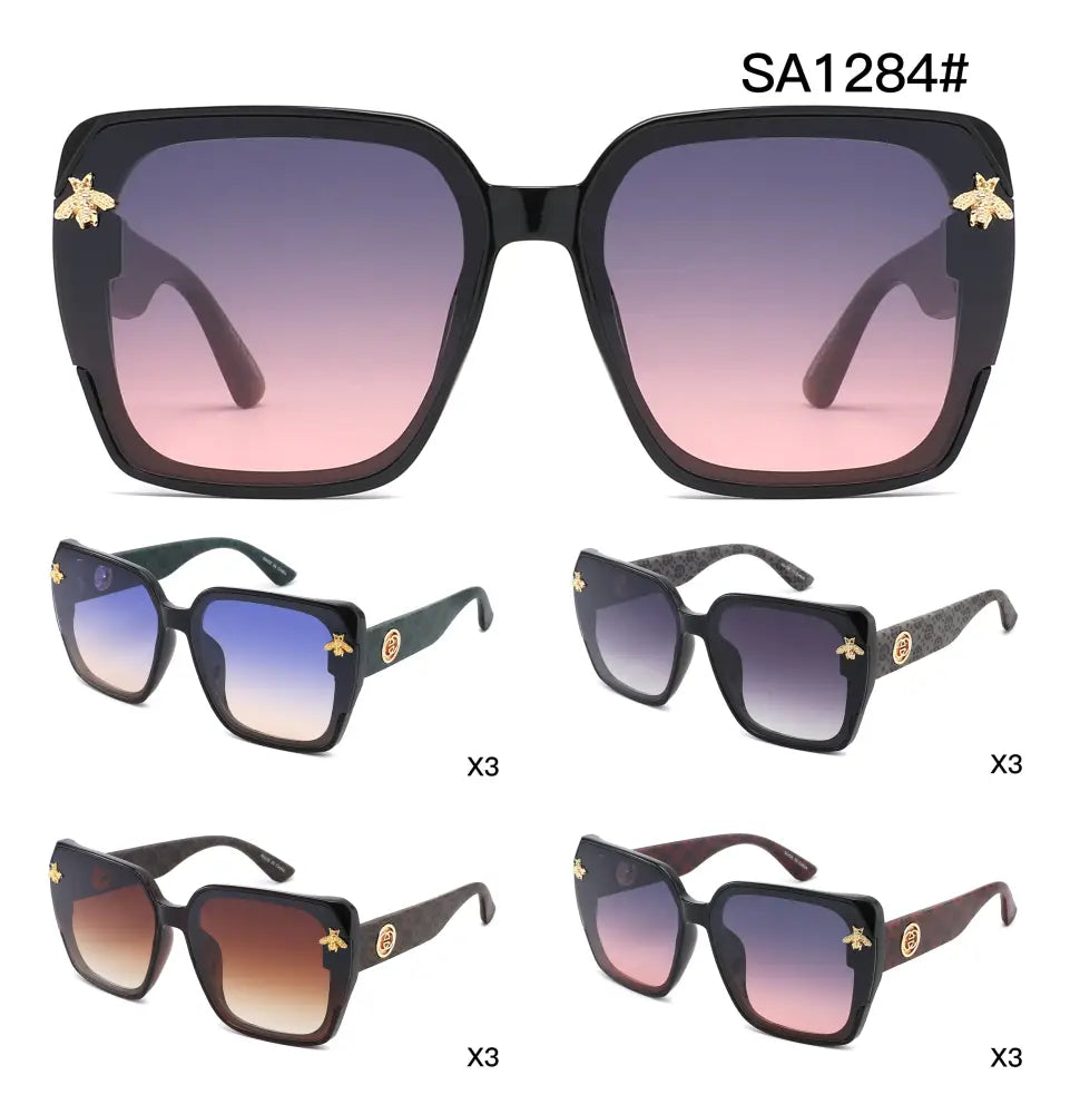 Set of 12 black square-framed sunglasses with gradient pink to purple lenses and gold bee embellishments on the temples