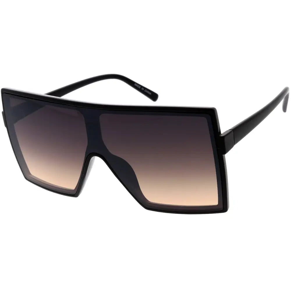 Set of 12 black oversized sunglasses with bold rectangular frames and gradient brown to tan lenses