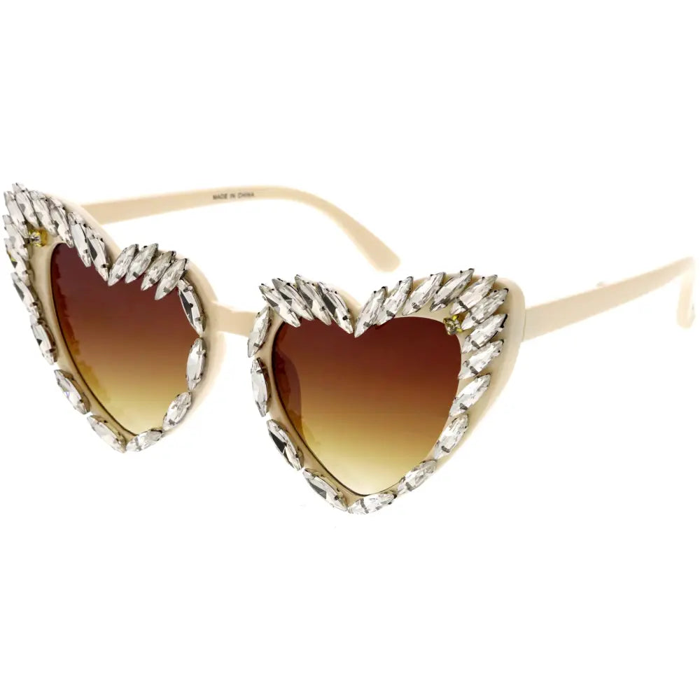 Cream-colored heart-shaped sunglasses with gradient brown to yellow lenses and clear rhinestones outlining the frame set of 12